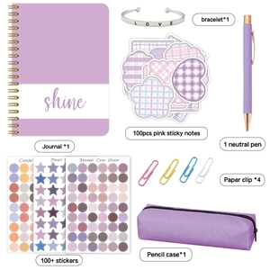 Purple DIY journal stationery gift set with notebook, stickers, pen, and jewelry