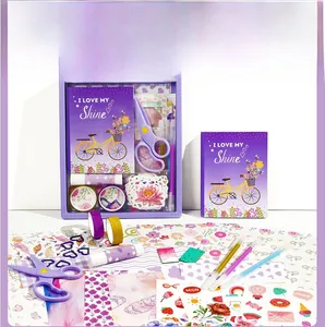 Detail view of purple DIY journal set with notebook, floral stickers, and glitter pens