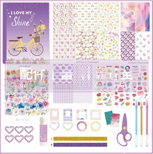 Detailed flat lay of a 180-piece purple floral stationery set with notebook and stickers