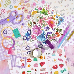 180-piece floral scrapbook kit with purple scissors, pens and vintage flower stickers