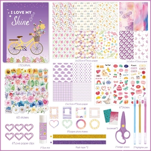 DIY scrapbooking kit with 180 vintage floral stickers, notebook, and craft tools in purple
