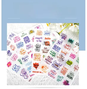 Close-up of colorful inspirational quote stickers featuring Dream Big and Be Brave phrases