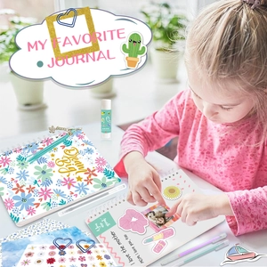 Kids DIY blue journal set with spiral notebook floral stickers and creative stationery kit