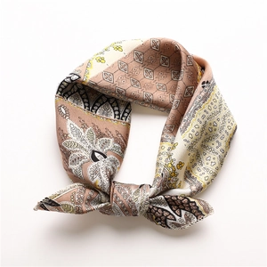 Satin paisley print silk scarf in warm brown and beige with a stylish knot display