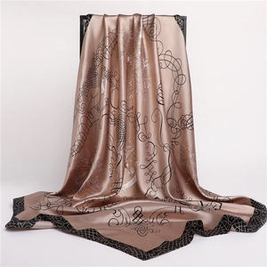 Elegant champagne satin silk square scarf with vintage scroll patterns and geometric borders