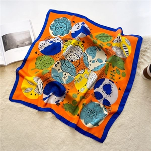 Colorful floral square silk scarf for women in vibrant orange and blue color blocks