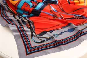 Detail of the high-density satin silk square scarf with horse bridle and chain pattern