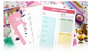Detail of 4-pack macaron color weekly planner stickers and journal inserts for children