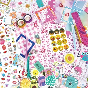 DIY Journal Kit for girls including stickers, tape, scissors, and stationery in pink and purple