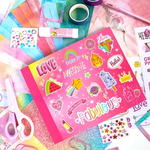 Pink DIY journal kit for girls featuring scrapbook stickers and decorative stationery items