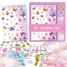 Flat lay of pink butterfly DIY journal set with notebook, stickers and colorful pens