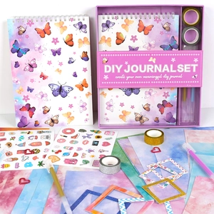 Comprehensive DIY butterfly journal kit with notebooks, glitter tape, and stickers
