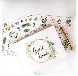 Wedding guest book set with white floral cover, decorative stickers and gold diamond pen