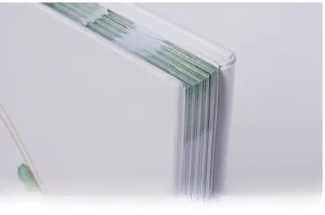 Close-up of guest book edge showing premium edge binding and thick white cover