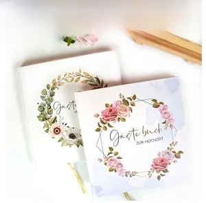 Détails des livres d'or de mariage allemands avec fleurs et motifs géométriques dorés