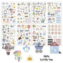 Detail of floral baby shower game cards with monthly milestone stickers and animals