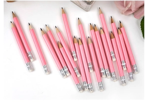 Pink baby shower pencils with white erasers and floral accents for DIY guest activities
