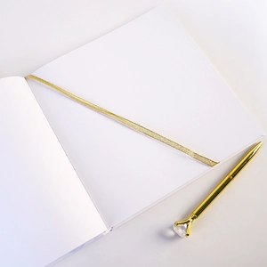 Minimalist white wedding guest book set with gold coil and diamond topped pen