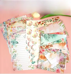 Detailed set of floral watercolor stationery including envelopes, paper and seal stickers