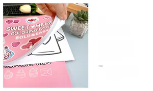 Detail showing the Sweetheart coloring book interior pages with heart themed illustrations