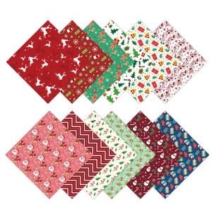 12-pattern Christmas scrapbook paper set featuring Santa, snowman, and reindeer designs