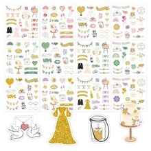 Detail view of multi-page gold foil wedding stickers with cakes, hearts and banners