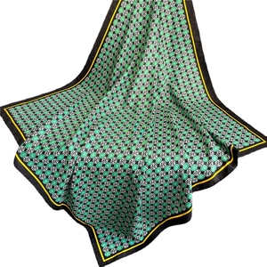 Green and black floral silk scarf with Z logo pattern and contrasting yellow borders
