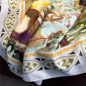 Detail of oil painting style silk scarf showing artistic print and fine fabric texture