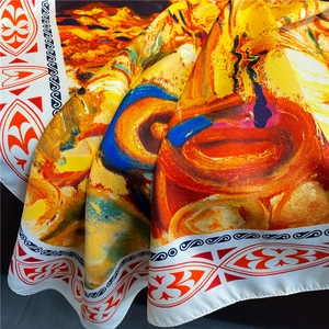 Detail of oil painting style silk scarf showing luxury texture and vibrant artistic print