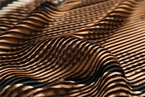 Macro shot of pleated fabric with classic brown and black check pattern texture