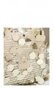 Détail du tissu à paillettes dorées champagne de haute qualité avec chaîne en métal