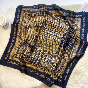 Detailed pattern of ethnic style silk scarf with geometric sun flower prints and borders