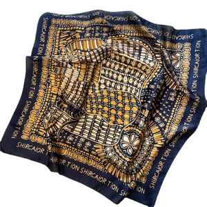 Navy blue and orange ethnic print faux silk square scarf with geometric art patterns