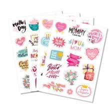 Detail view of four Mother's Day sticker sheets with pink hearts and floral designs