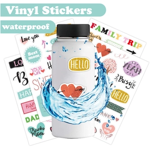 Waterproof family themed vinyl stickers for scrapbooks on a white water bottle