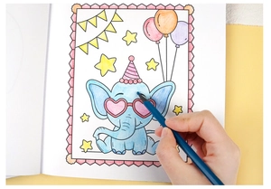Close-up of kids coloring book with cute elephant illustration and a blue colored pencil