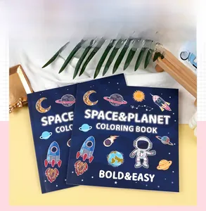 Close-up of Space and Planet coloring book covers with astronaut and rocket illustrations