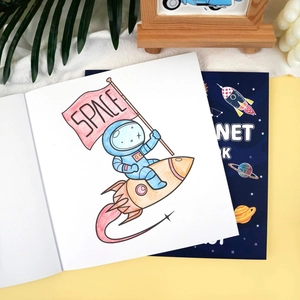 Space themed coloring book for kids featuring astronaut riding rocket and planets