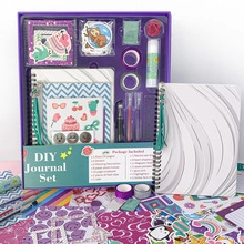 Macro view of 70-sheet spiral journal with stickers and glitter tapes for DIY crafts