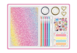 Detail view of DIY scrapbook set with glitter notebook, colorful pens and stickers