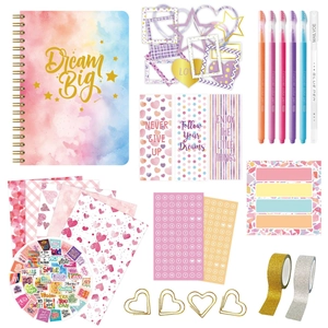 Flat lay of pink and blue DIY journaling set with Dream Big notebook and stationery