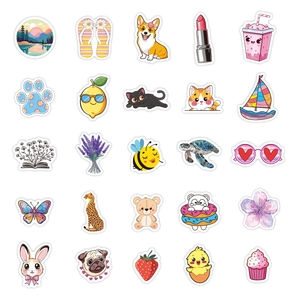 Flat lay detail showing 25 diverse cartoon VSCO stickers with white borders and cute designs
