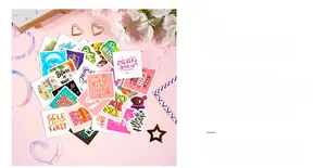 Detail of colorful DIY scrapbooking sticker set with motivational quotes and die-cut frames