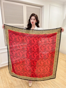 Detailed view of 110cm silk square scarf with red rose pattern and leopard print border