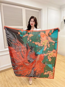 Detail of 110cm square silk scarf featuring orange goldfish and peony flower patterns