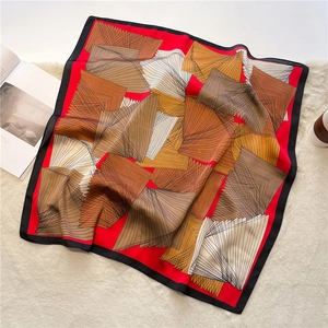 70x70cm elegant red geometric square silk scarf with bold color blocks on plush carpet