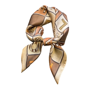 Silk neck scarf with beige and orange geometric letter patterns and chain design