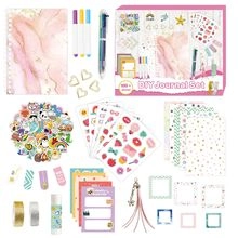Flat lay of pink marble DIY journal set including 200 stationery accessories and stickers