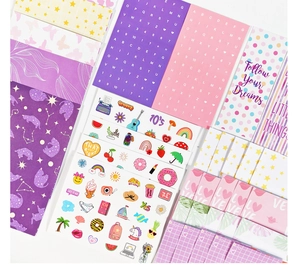 Detail showing decorative stickers, alphabet decals and motivational quotes cards for journaling