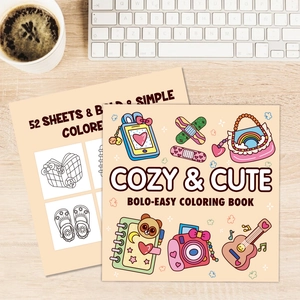 Cozy and Cute Coloring Book with 52 bold simple sheets on a minimalist wooden desk